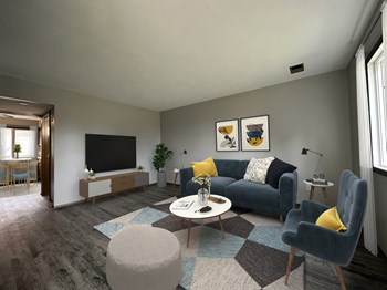 a living room with gray walls and a blue couch with yellow pillows and a white coffee - Photo Gallery 10