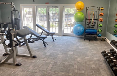 Fitness center with treadmills and other exercise equipment at Merrick Place, Lexington, KY, 40502