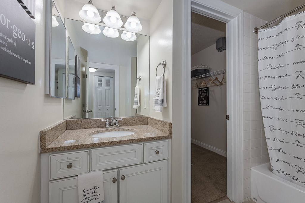 Bathroom and closet at Harpers Point Apartments, Cincinnati, OH