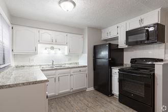 Updated Kitchen With Black Appliances at Huntley Ridge, Kettering, Ohio