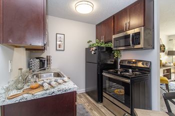 Fully Equipped Kitchen Includes Frost-Free Refrigerator, Electric Range, & Dishwasher at Weaver Farm, Florence, 41042