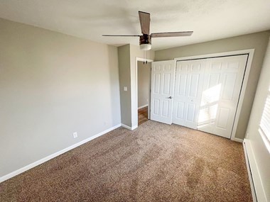an empty bedroom with a ceiling fan at Ridgeview, Fortville, 46040 - Photo Gallery 4