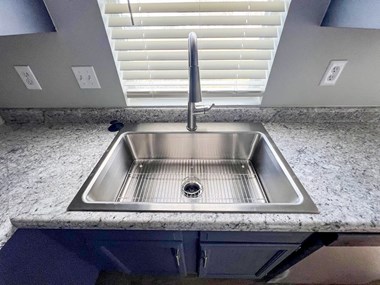 a kitchen sink with a faucet and a window at Ridgeview, Fortville, 46040 - Photo Gallery 2