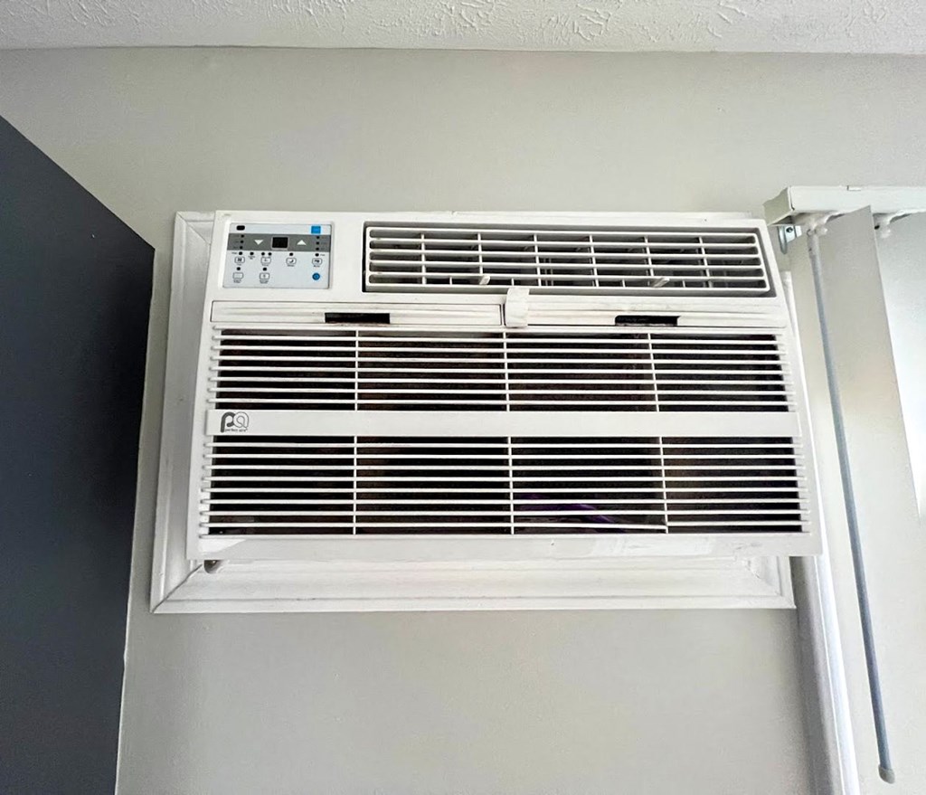 a window air conditioning unit on a wall at Ridgeview, Indiana