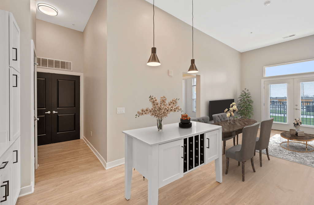 an open kitchen and dining room with a table and chairs