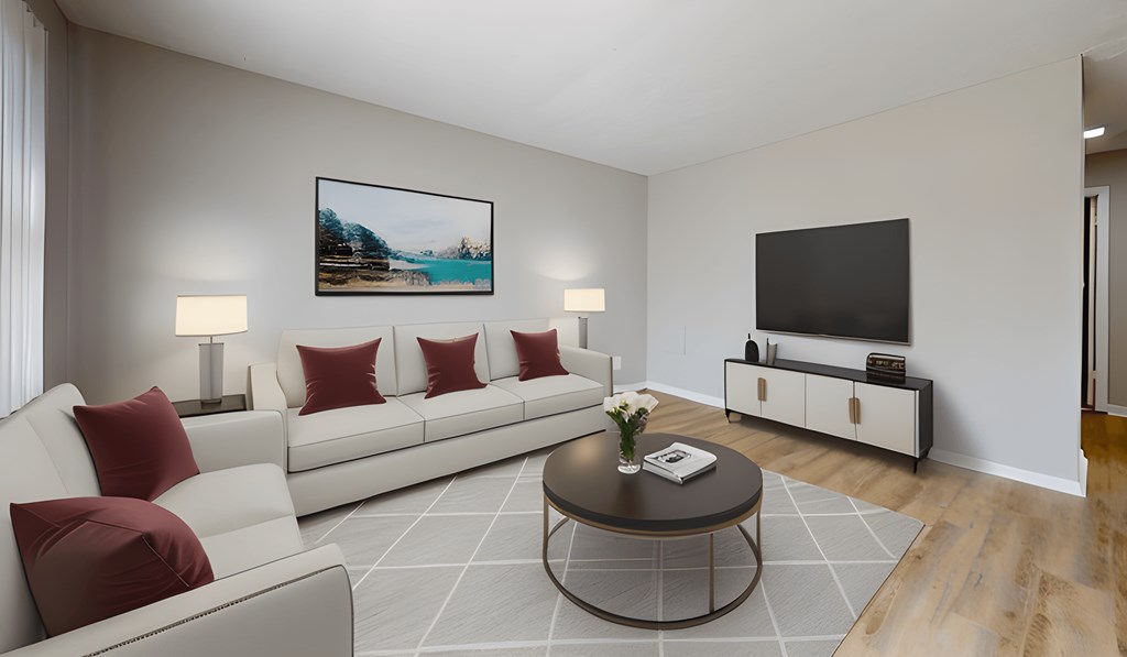 a living room with couches and a coffee table at Stonebrook of Franklin, Franklin, IN, 46131