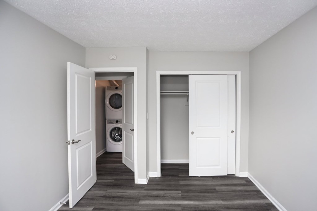 A laundry room with a washer and dryer.