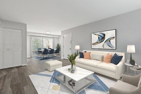 Living room with a white couch and a table at Merrick Place,  40502