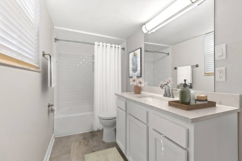 Bathroom with a sink and a toilet and a shower at Merrick Place, Lexington, KY, 40502