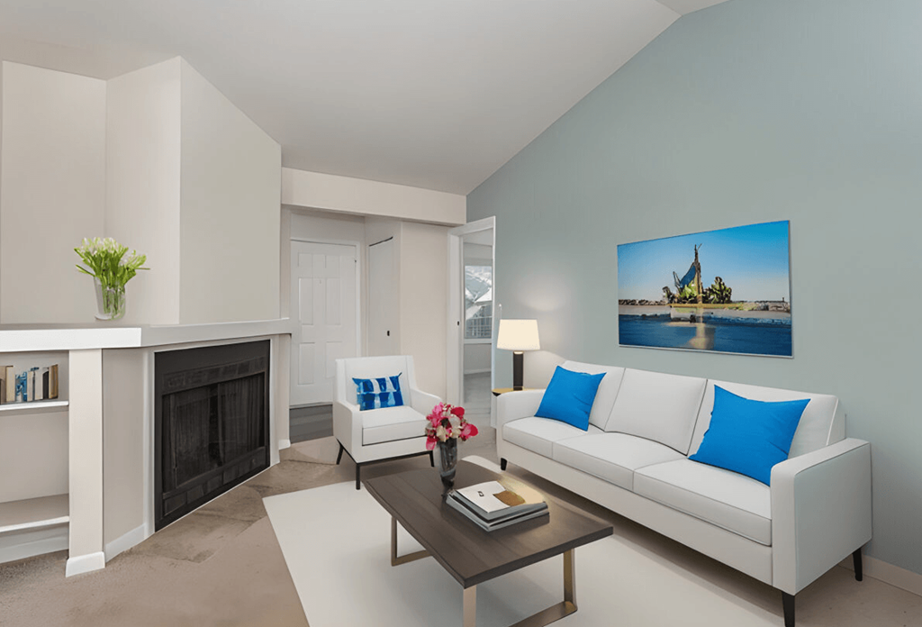 Living room with a white couch and a coffee table at Normandy Club, Centerville