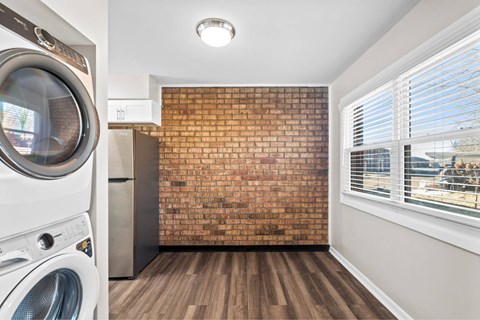 A laundry room with a washer and dryer at Fountain Parc Apartments, Indianapolis, Indiana
