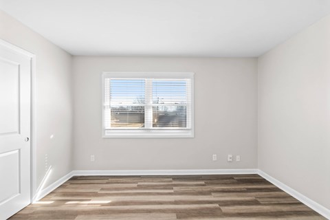A room with a window and a door at Fountain Parc Apartments, Indianapolis, IN