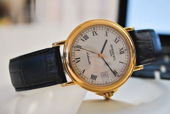 Gold watch with a white face and black straps at Indian Lookout, West Carrollton, OH