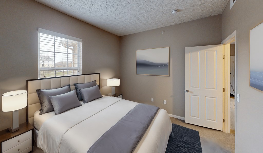 a bedroom with a large bed and a window at Prescott Place, Ohio, 43235