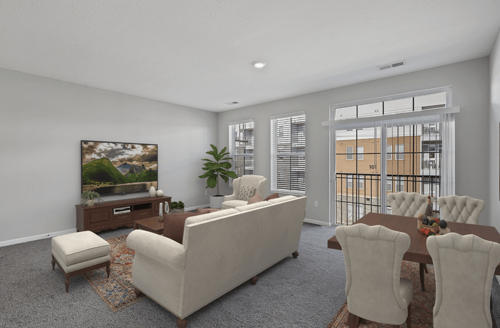 a living room with a couch and chairs and a table at Monmouth Row Apartments, Newport, 41071