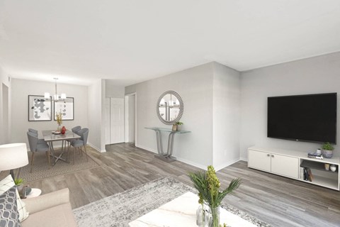 a living room with a couch and a tv at Merrick Place, Kentucky