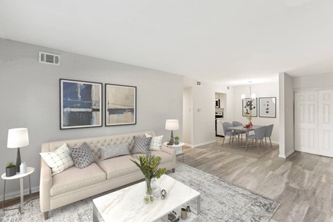 a living room with a couch and a table at Merrick Place, Kentucky