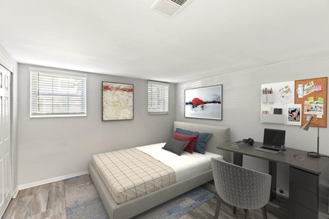 a bedroom with a bed and a desk with a computer at Merrick Place, Lexington, 40502