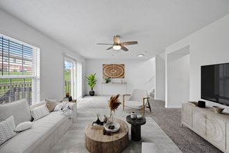 a living room with white walls and carpet - Photo Gallery 2