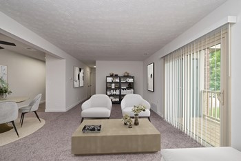 Living Room With Expansive Window Living Room With Expansive Window at Millcroft Apartments and Townhomes, Ohio, 45150 - Photo Gallery 4