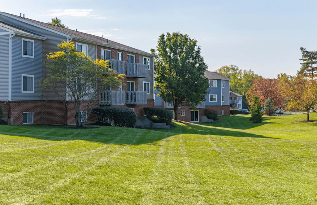 a large lawn in front of an apartment building at Weaver Farm, Florence