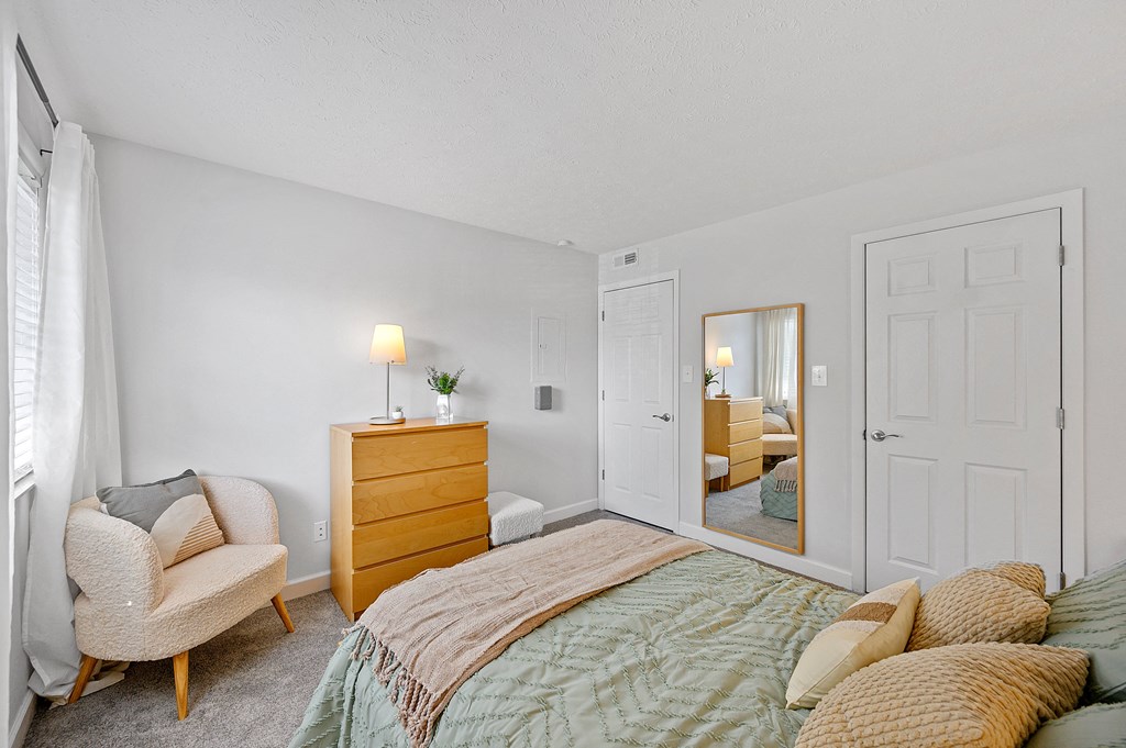 Bedroom with a bed and a mirror at Wrights Point, KY, 41011