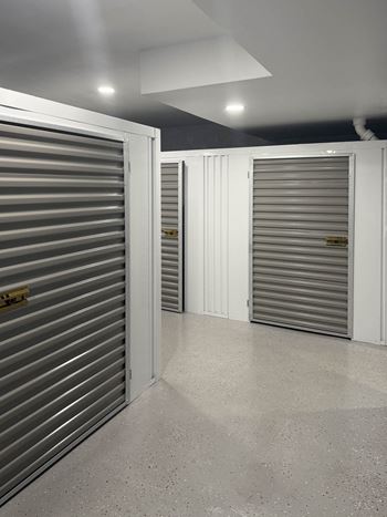 A storage facility with closed grey doors at Rose Hill Apartments, Alexandria, VA