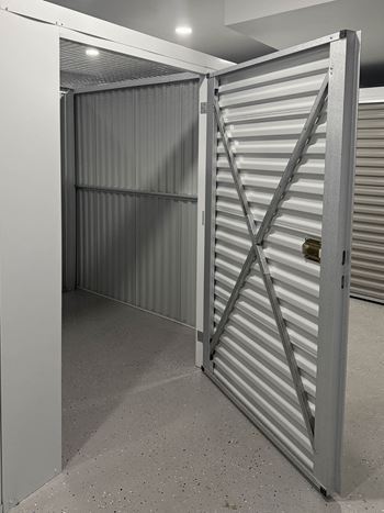 A metal gate with a lock is closed at Rose Hill Apartments, Alexandria, 22310