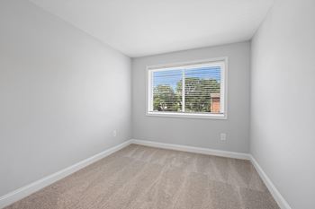an empty room with white walls and a window at Rose Hill Apartments, Virginia, 22310