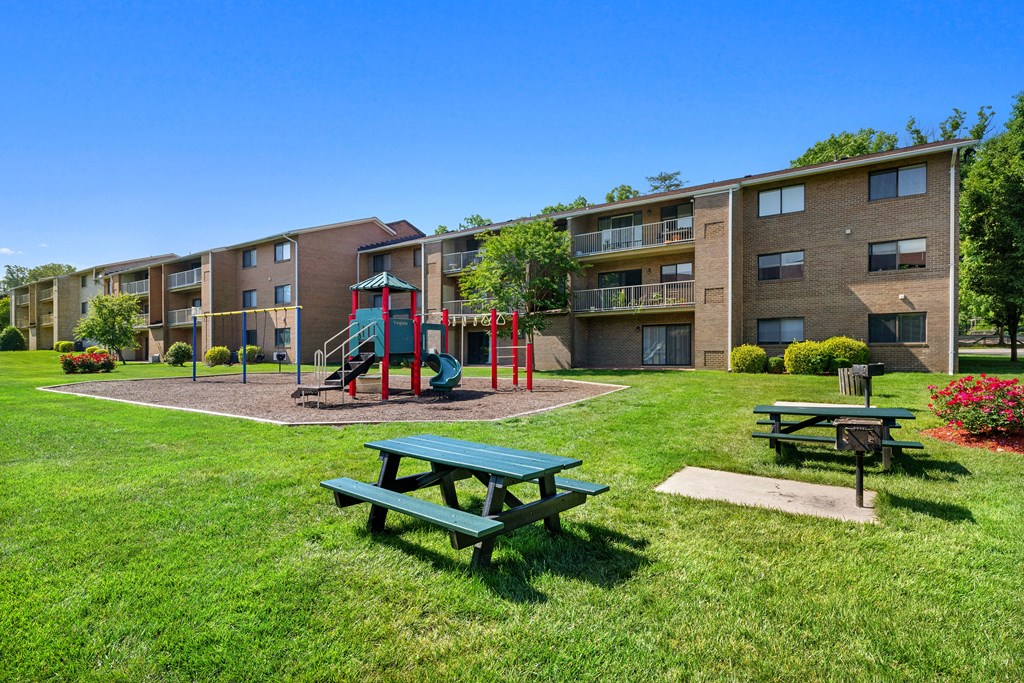 our apartments have a playground and picnic tables at Gainsborough Court Apartments, Fairfax, VA