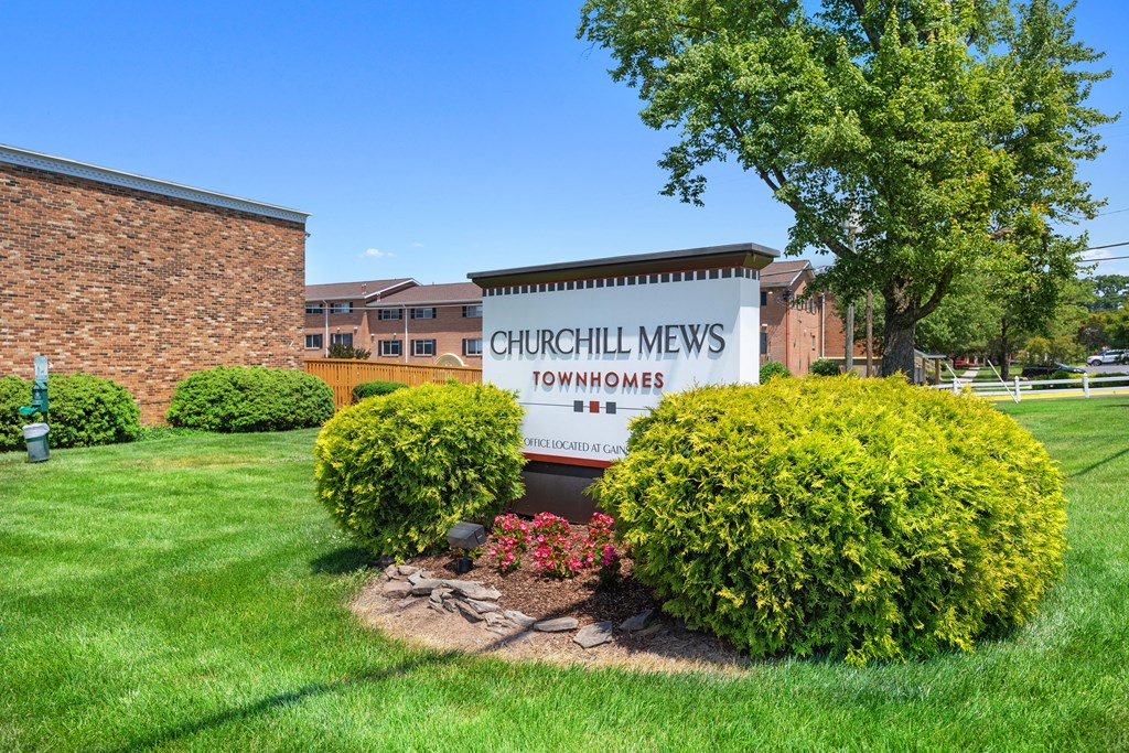Our sign in front of our building at the apartments for rent at Gainsborough Court Apartments, Virginia