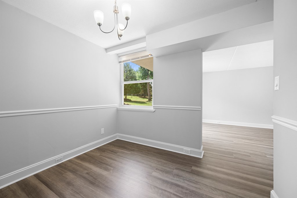 an empty room with white walls and a window at Stuart Woods* Apartments, Herndon, 20170