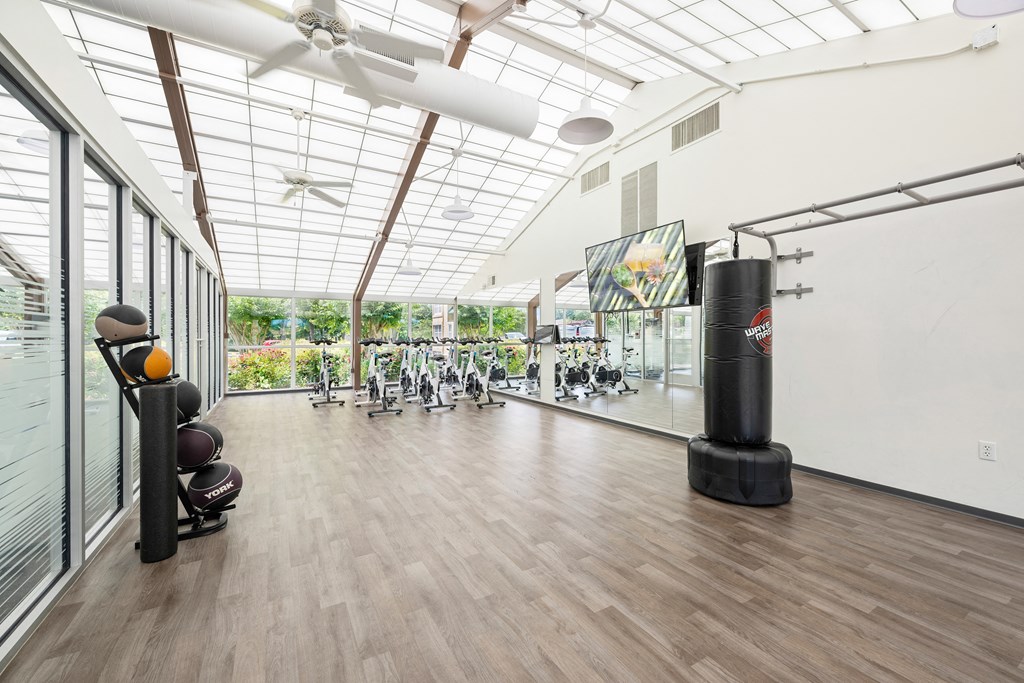 the gym atrium at the preserve at green valley apartments co at Stuart Woods* Apartments, Herndon, Virginia