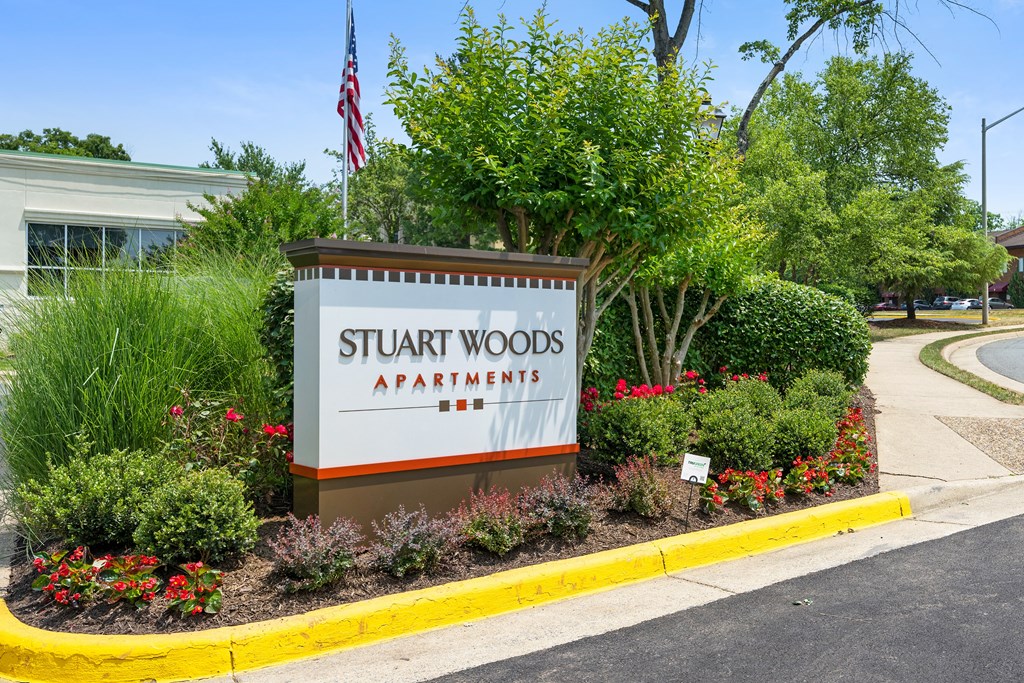 the sign outside at Stuart Woods* Apartments, Herndon, VA