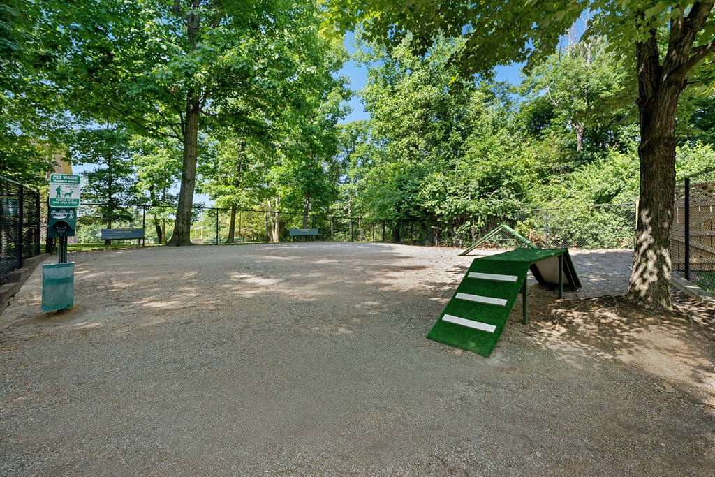 the park has a playground and a picnic table at Gainsborough Court Apartments, Fairfax, Virginia