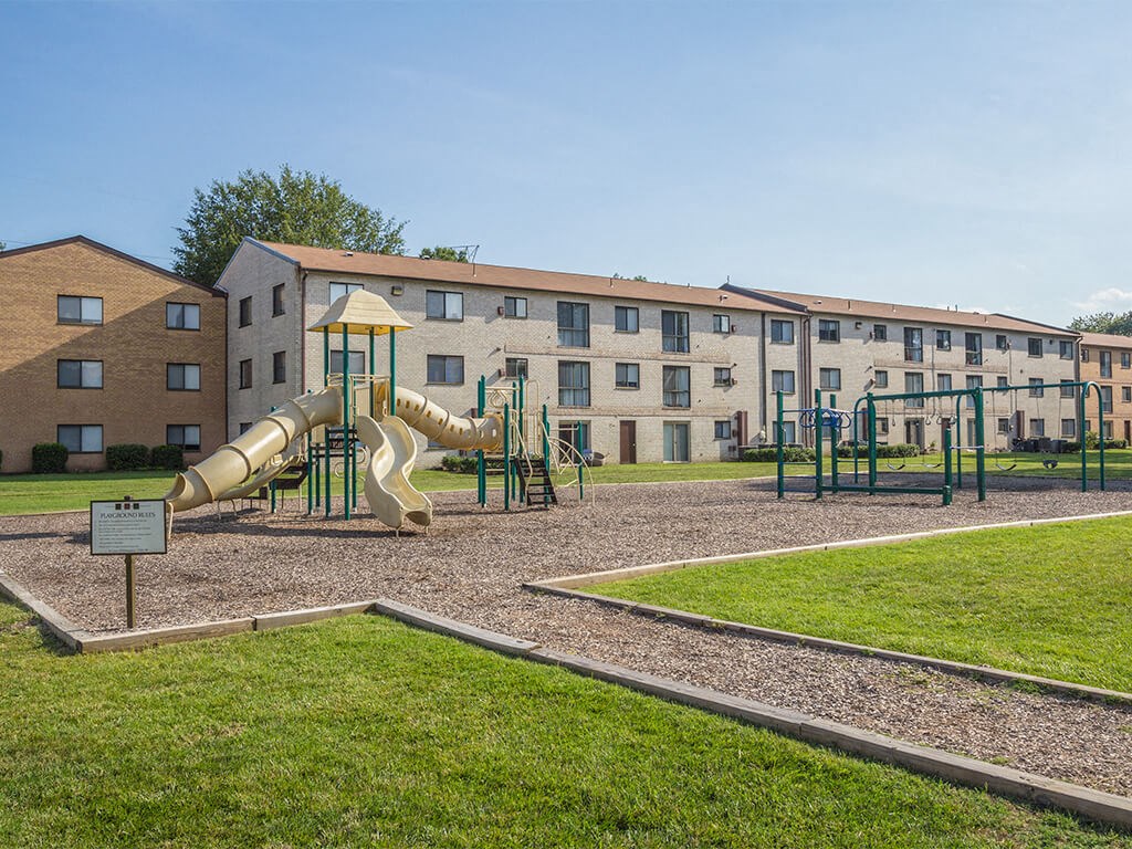 Playground structure with woodchip path at Rose Hill Apartments, Virginia, 22310