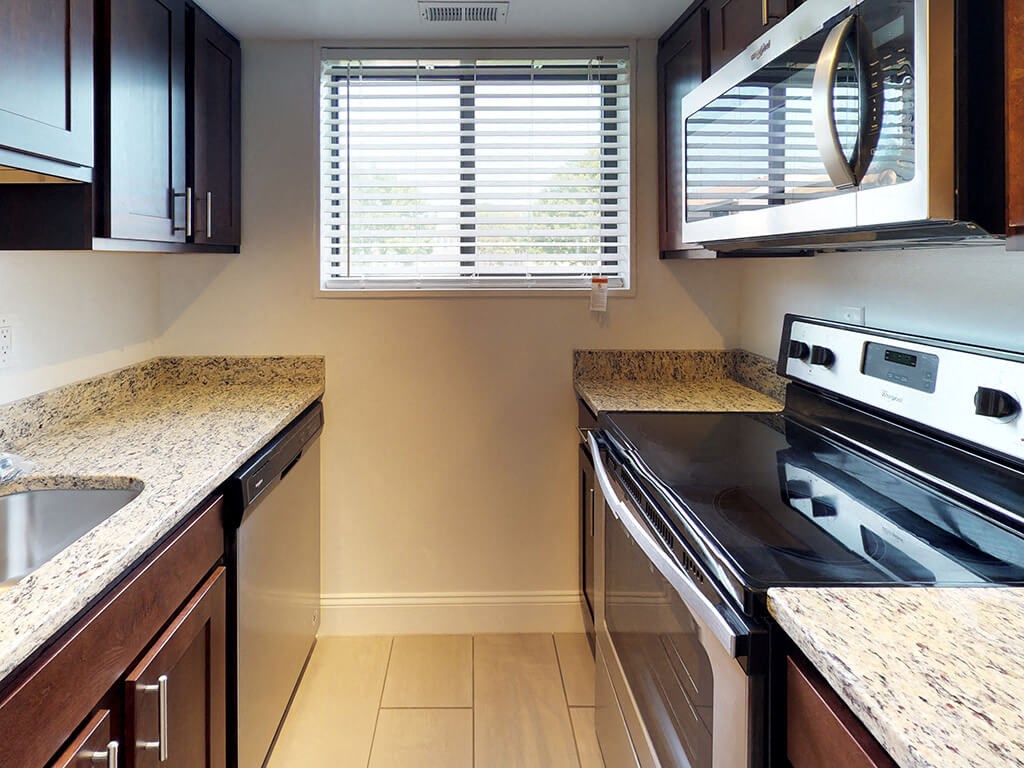 Interior view of kitchen in apartment unit for bren mar