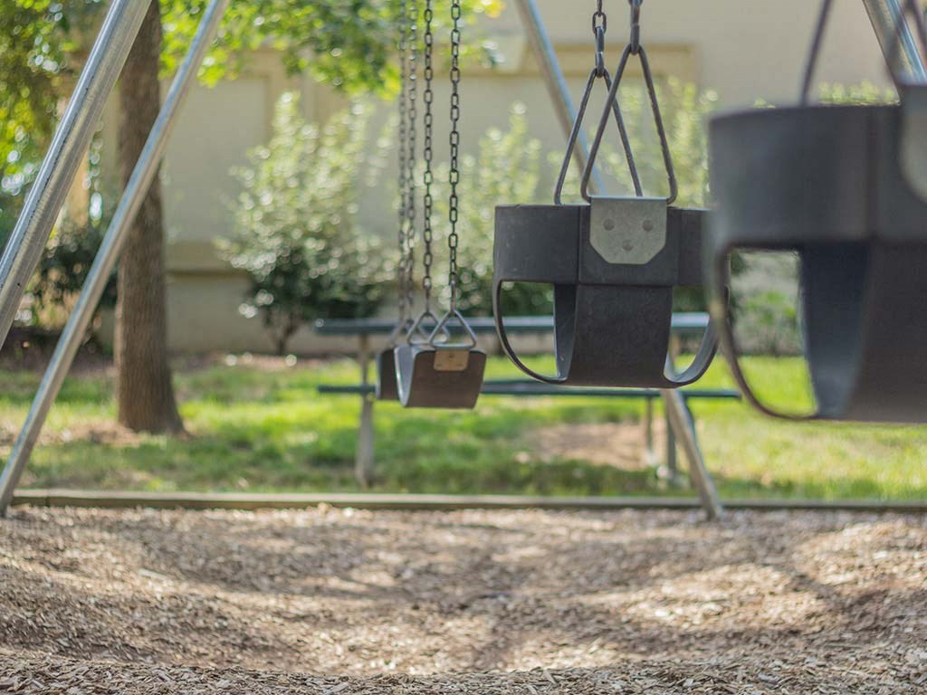 Swings At Playground at Stuart Woods, Herndon