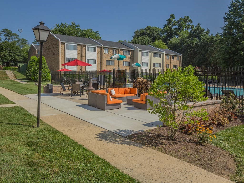 Outdoor seating are with walkway at Tysons Glen Apartments and Townhomes, Virginia, 22043