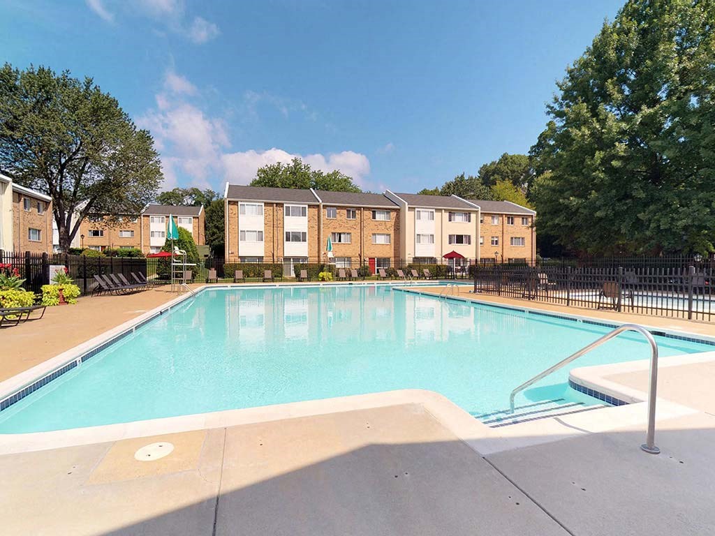 Large outdoor pool during day at Tysons Glen Apartments and Townhomes, Virginia