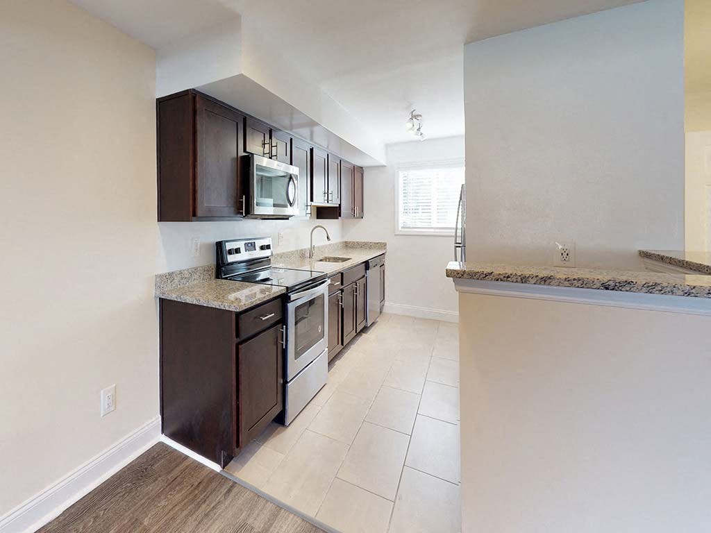 Large kitchen area with stainless steel appliances at Tysons Glen Apartments and Townhomes, Falls Church, VA