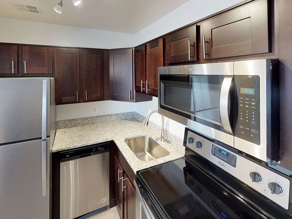 Modern stainless steel appliances at Woodlee Terrace Apartments, Woodbridge, VA