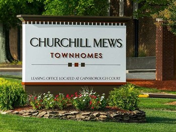 Placard with the Churchill Mews logo near apartments entrance - Photo Gallery 5