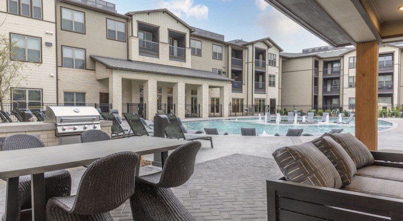 Resort-Style Pool with Grilling Area, Tanning Ledges, Cabanas & Hot Tub at The Bridge at McKinney