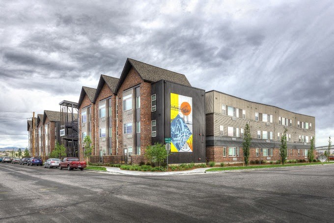 a large building with a mural on the side of it