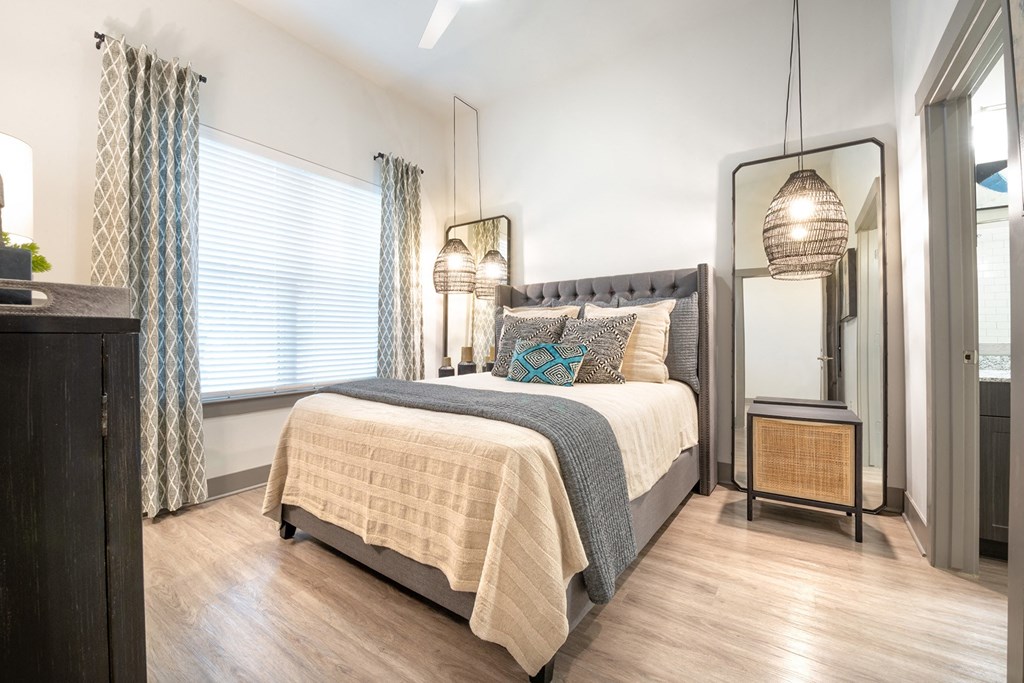 A Spacious Bedroom with Large Windows at The Bridge at McKinney, McKinney, Texas, 75069