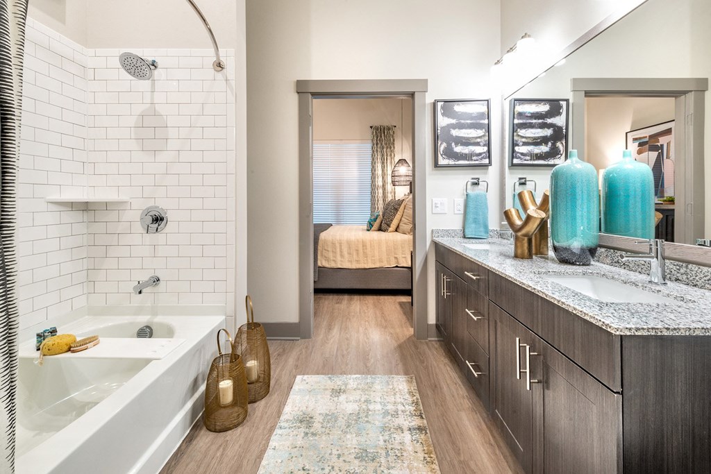 Spacious Bathroom with Oversized Soaking Tub and Designer Style Backsplash at The Bridge at McKinney, McKinney, Texas, 75069