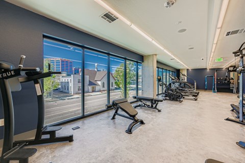 A gym with a view of the city.