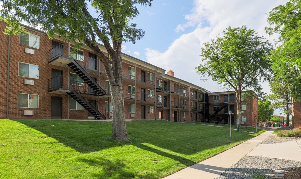 our apartments offer a spacious courtyard with green grass