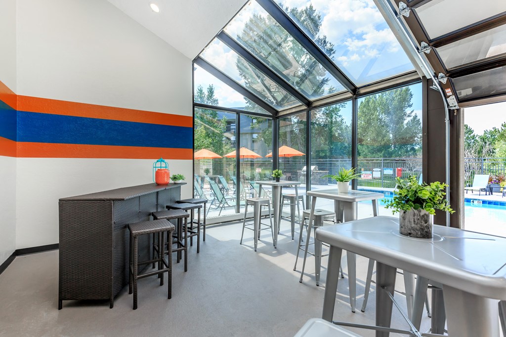 A patio with a table and chairs is shown.